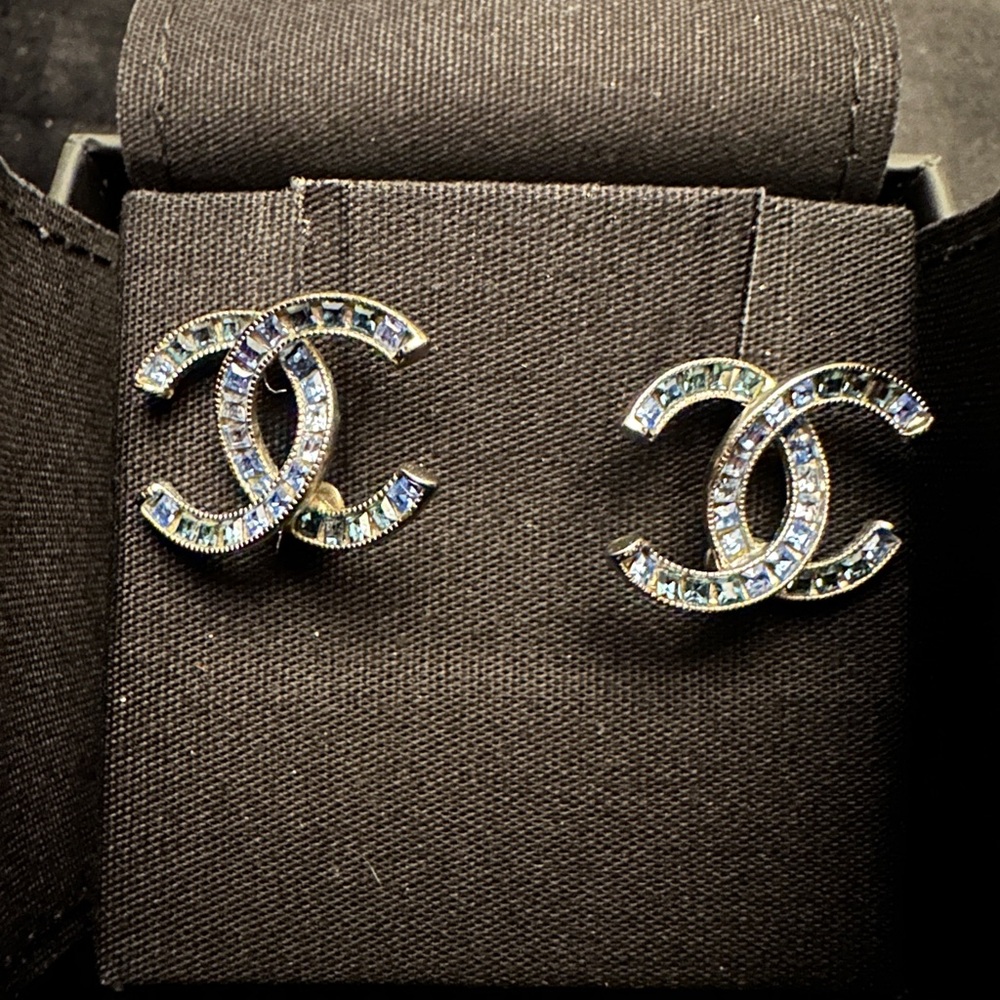 Chanel EaringsCC. Silver and stones are blue and are approx size of a dime